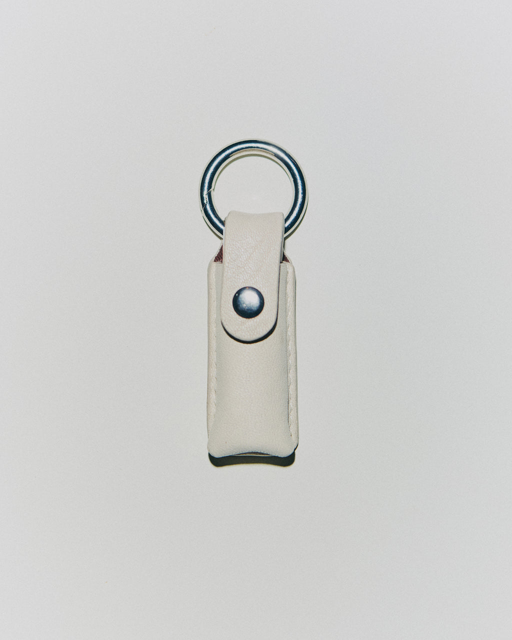 HANDBAG CHARM - CLOUD DANCER